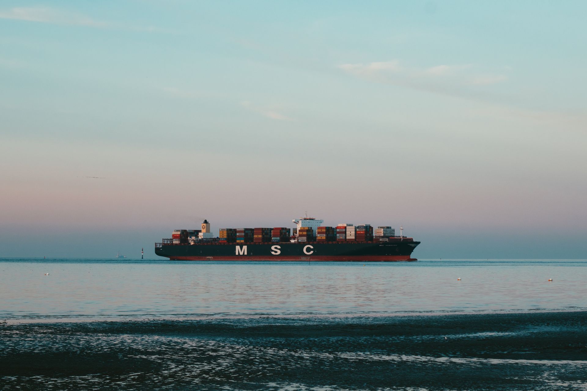 Container ship at dusk on the Türkiye trade lane